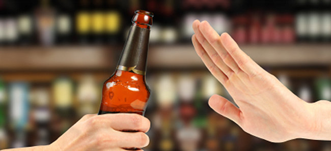hand reject a bottle of beer in the bar